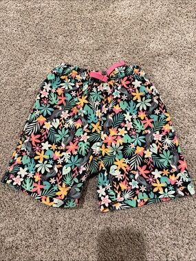 Chubbies—Tropical Floral Swim Trunks - Black Base with Multicolor Flowers